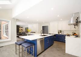 This is a modern featured kitchen with all the appliances but constructed in a traditional style. Transitional White Blue Kitchen With Some Gold