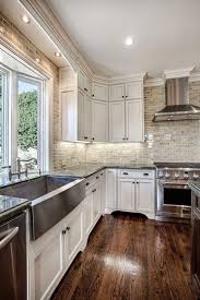 Antique White Kitchen Cabinets See The Before And After Pictures Of This Farmhous In 2020 Kitchen Backsplash Designs Antique White Kitchen Traditional Kitchen Design