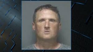 Woman found locked in back of moving truck, son arrested