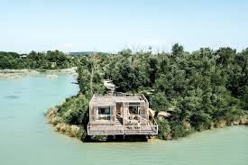 Wood cabins or tent sites. Gcp Wood Cabins Hotel Atelier Lavit Archello