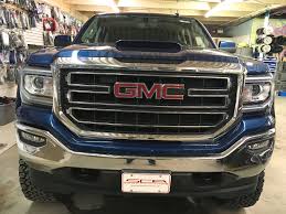 Is There Anything Subtle About This Truck Well Actually Yes Because You Won T Even See The Hidden Subwoofer That Is Capabl Pickup Trucks Gmc Sierra Rear Seat