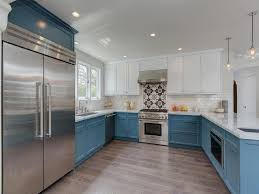 Pastel blue and grey two tone kitchen cabinets. White Upper Cabinets And Blue Lower Cabinets Transitional Kitchen