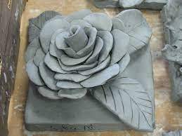 Learn To Sculpt Like A Pro With These 12 Useful Sculpting Tutorials Tutorials Press Ceramic Flowers Flower Sculpture Clay Sculpture Ideas