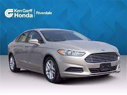 To open the trunk in a ford fusion with a dead battery, . Pre Owned 2015 Ford Fusion Se 4dr Car 3hut6923 Ken Garff Automotive Group