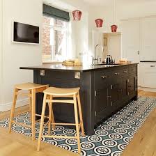 Porcelain floor and wall tile (14.53 sq. White Kitchen With Black Island And Feature Floor Tiles Kitchen Decorating Ideal Home Wooden Kitchen Floor Kitchen Floor Tile Kitchen Floor Tile Patterns