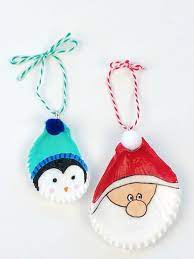 Covered white arc ball ornament. Christmas Painted Shell Ornaments Shell Crafts Diy Seashell Crafts Seashell Christmas Ornaments