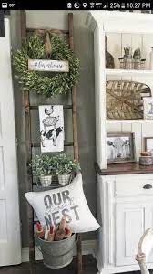 Check spelling or type a new query. Farmhouse Ladder With Our Blessed Next And Farm Cow Towel Wreath Farm House Living Room Rustic Farmhouse Living Room Farmhouse Style Living Room