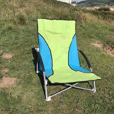 It only holds up to 250 lb but it's small and easy to pack. 2 Green Nalu Folding Low Seat Beach Chairs Kitchenalia Dynamicdesigndxb Mugs