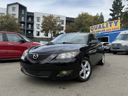 Image result for Sparkling Black 2007 Mazda3