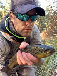 On the Metolius in Oregon, caught, landed, my 1st fly caught fish, nice 18"  Brown trout, both firsts. And