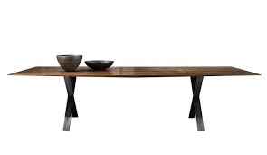 A rectangular white foldout top of wood rotates 90 degrees. More Lax Dining Table Smoked Oak Oiled Waxed Dopo Domani