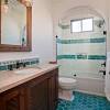 For example, cobalt blue talavera tiles in this shower compliment the green decorative tiles dressing up the backsplash as a wall tile. 3
