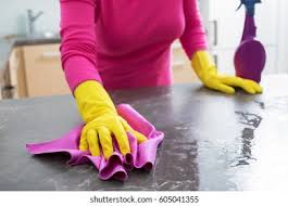 Check spelling or type a new query. Woman Spraying Kitchen Table Cleaning Stock Photo Edit Now 605041355