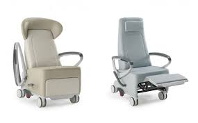The Wheel Design On This Recliner Allows The Chair To Be Moved With Ease In Healthcare Furniture Restoration Hardware Dining Chairs Oversized Chair And Ottoman
