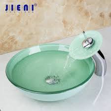 A glass sink and waterfall faucet add a beautiful touch to any bathroom. Jieni Jade Green Glass Basin Sink Countertop Basin Sink Faucet Set Bathroom Washbasin Sink Round Bowl Bathroom Faucet Bathroom Sinks Aliexpress