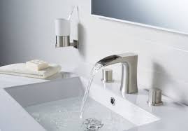 The thin design of this chrome faucet is in cool contrast. Modern Traditional Bathroom Faucets Modern Bathroom New York By Rivuss Houzz