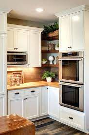 Whether you decide to close them off with a custom glass door or leave them exposed, having a full wall with angled shelves is perfect to organize spices, utensils, and decor. Corner Kitchen Shelves Full Size Of Kitchen Design Cabinet Corner Wall Cabinet Corner Kitchen Wall Unit Co Cuisine Moderne Armoire De Cuisine Etageres Ouvertes