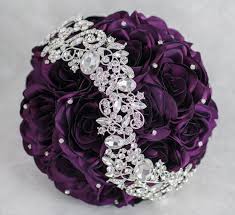 To look after a similar one, which can save you much money. Add A Couple Red Ones In There And Wrap It In Black Ribbon And Its Perfect Purple And Silver Wedding Purple Wedding Bouquets Jeweled Bouquet