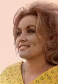 Dolly parton's signature 60's beehive. Dolly Parton Natural Hair Color Off 71 Quality Assurance
