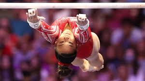 Uneven bars champion and balance beam silver medalist; Zfrih8cuyg8k8m