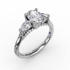 Shop our collection or design your own! Fana Classic Oval Three Stone Diamond Engagement Ring With Pear Shape Side Diamonds Davidson Licht