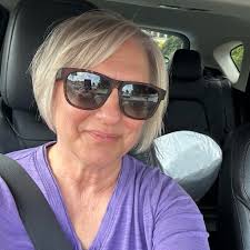 Lemon plates from the dollar store, lemon placements from who knows where…  sterling silver… lemon centerpieces… I was having stone crabs so I used  lemon bowls for the shells… love this look.