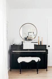 a designer s secret to creating a modern yet inviting living room piano living rooms piano room decor piano decor
