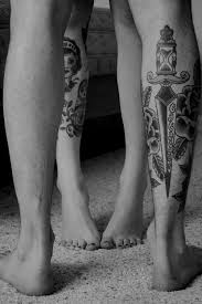 Attractive Black And White Calf Tattoos For Men Love The Time Reference On Top Of The Dagger Leg Tattoos Trendy Tattoos Tattoos