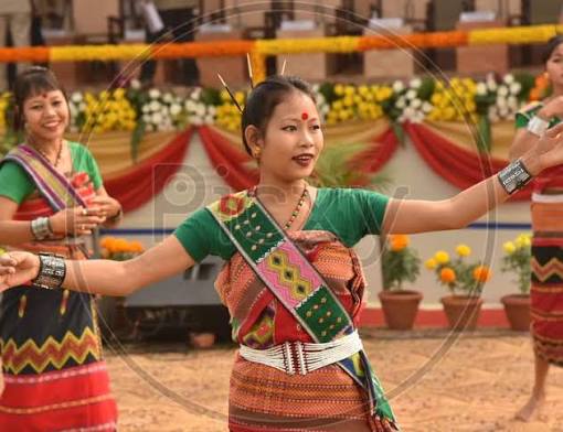Image of Artists perform a traditional dance during the Bodoland Territorial Council oath-taking ceremony at Greenfield, in Kokrajhar District of Assam on December 15, 2020-EE686931-Picxy
