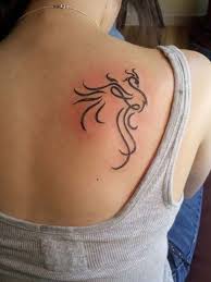 Outline tribal phoenix tattoo designs. Picture Of Tribal Phoenix Tattoo On The Shovel