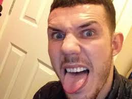 Jilted yob punched his ex as she held tot in her arms