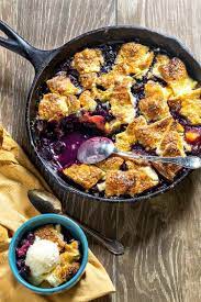 This Blueberry Peach Pandowdy Recipe Is Filled With Ripe Fruit And Has Pastry Both Tucked Under The Fruit Berries Recipes Homemade Recipes Dessert Peach Recipe