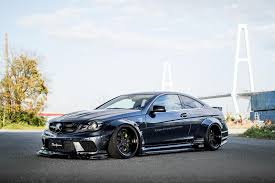 Mercedes Amg C63 Coupe And Sedan Graduate From The Liberty Walk Academy Mercedes Benz C63 Mercedes Benz C63 Amg Black Series Mercedes Benz C63 Amg