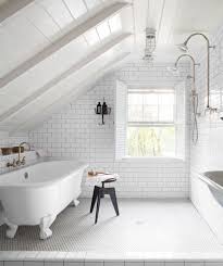 The shower, sink, and commode are lined up on the far wall, adjacent to the door and towel rack. 16 Dreamy Attic Rooms Sloped Ceiling Design Ideas