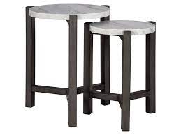 The plec table collection fits perfectly into any setting and… Signature Design By Ashley Crossport 2 Piece Nesting Accent Table Set With White Marble Look Tops Royal Furniture End Tables
