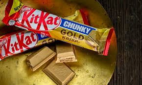 She's slapping the kit kat bar lightly to draw chandler's attention to it. Nestle Launches A New Kitkat Chunky Gold Krisp Chocolate Bar Daily Mail Online