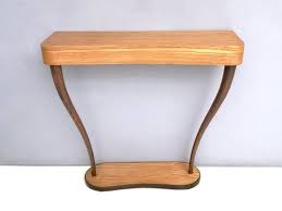 The uniquely bent steel frame supports a contrasting zebra wood top in a warm brown. Italian Zebra Wood And Mahogany Console Table 1950s For Sale At Pamono