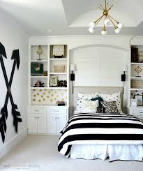 Teenager kid in cap holding hanger with blue shirt at home. 40 Beautiful Teenage Girls Bedroom Designs For Creative Juice