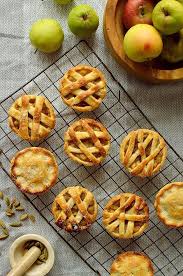 Mini Apple Hand Pies Baked In A Muffin Tin Spiced With Cardamom And Cinnamon Mini Apple Pie Recipe Recipes Apple Recipes