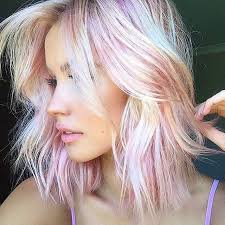 Perfect for the woman who wants to make a statement with her hair, this color combination of red, blonde, and pink tones is sure to create the look you are going for. Trendy Hair Color Pink Pearly Hair Hipster Fashion Leading Hipster Style Fashion Magazine Making Fashion Pop
