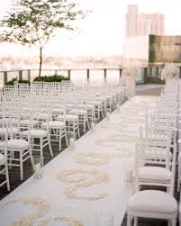 The Ceremony Took Place On An Outdoor Terrace At The Hotel Guests Sat In Rows Of Chiavari Chairs And White Flower Petal Elegant Couple Wedding Elegant Wedding