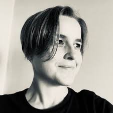 Radclyffe Hall (wearing an extraordinary hat!) and an alert little Griffon  Bruxellois at a dog show, likely around 1920. Griffons were the first dogs  Hall and Troubridge showed under their Fritz-John Kennel