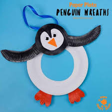 Glue on the beak, belly, feet, and eyes! Paper Plate Penguin Wreath Kids Craft Room