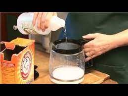 Glass coffee carafes are attractive and timeless, yet cleaning carafes made of glass is more involved than other coffee carafes. Kitchen Cleaning How To Use Vinegar To Clean Coffee Pots Youtube