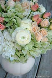 Green Hydrangea Apricot Spray Roses Ivory Ranunculus Love This Arrangement Flower Arrangements Hydrangea Flower Arrangements Flowers