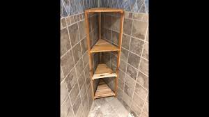 W ceramic wall mounted corner shower shelf tile in white a large corner shelf with room for all the a large corner shelf with room for all the bottles and other odds and ends that live in your bathroom. Cedar Shower Shelves Youtube
