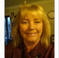 Who can recommend a groomer in Whanganui for a difficult dog?