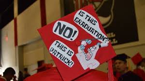 Browse custom grad party yard signs, giant letters, or other staked decorations! Graduation Caps Decorated To Celebrate Accomplishment But Also Promote Political Messages