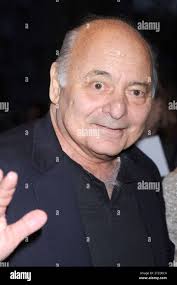 In a March 16, 2011 photo, Heather Coffy, left center, poses outside the  St. Monica School with her children, Delano Coffy, 15, top right, Darius  Coffy 11, bottom right, and Alanna Marshall,