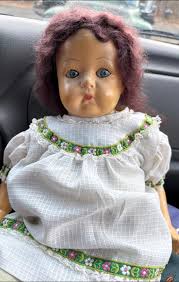 Hello. I came across this vintage doll and was wondering if anyone can help  me identify and value her. She has a mark
